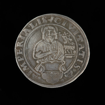 talar - Ujęcie awersu. Na awersie monety dwugłowy orzeł cesarski, napis w otoku i znak mincerski.