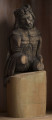 E/422/ML - Rzeźba wykonana w jednym kawałku drewna lipowego. Bez polichromii. Głowa nachylona w prawo, lewa ręka spoczywa na kolanie.