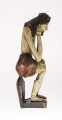 Rzeźba drewniana przedstawiająca postać Chrystusa Frasobliwego. Wykonana z jednego kawałka drewna lipowego. Głowa wsparta na prawej dłoni, która opiera się na kolanie. Rzeźba polichromowana: włosy – czarne, podstawa – czarna,. Ciało – białe, perizonium – brązowe. Na podstawie z przodu wyryta data 1864 oraz IHS.