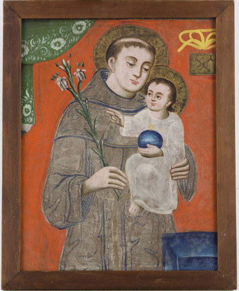 Obraz na płótnie przedstawiający Św. Antoniego z Dzieciątkiem, na czerwonym tle.