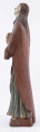 E/16137/ML - Rzeźba drewniana, pełna, polichromowana, przedstawiająca św. Anny. Na postumencie w kształcie nieregularnego prostokąta, zakomponowana postać świętej, w długiej sukni, układanej w pionowe fałdy. U góry fałdy są drobniejsze, u dołu fałdy grubsze, pod szyją kołnierzyk w kształcie półokrągłej plisy. Na sukni kubraczek w kolorze brązowym, sięgający do połowy łydki, o połach zaokrąglonych u dołu. Kubrak z długimi rękawami jest dopasowany w czasie. Z przodu do pasa podkreślony jest dość wąskimi pionowymi żłobieniami, od pasa szerszymi biegnącymi ukośnie fałdami, zaś na rękawach ukośnymi nieregularnymi żłobieniami. Ręce złożone na piersiach do modlitwy. Głowa wzniesiona lekko do góry i lekko przechylona w prawo. Włosy brązowe, zaznaczone z przedziałkiem pośrodku, opadające na plecy, podkreślone żłobieniami. Nos prosty wydatny, usta wąskie, oczy owalne czarne, brwi cienkie łukowate czarne. Twarz i ręce pokryte cielistą farbą. Widoczne uszy. Spod sukni widoczne bose stopy.

Konserwacja: 1988 r.