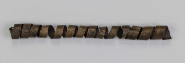 1396/A/ML/1 - Spiralny skręt z taśmy brązowej będący częścią zespołu ozdób brązowych tkz. 