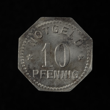 10 fenigów - rewers; Moneta ośmioboczna. W polu nominał 10 PFENNIG, powyżej pomiędzy pięcioramiennymi gwiazdkami napis po łuku: NOTGELD, całość w perełkowej obwódce.