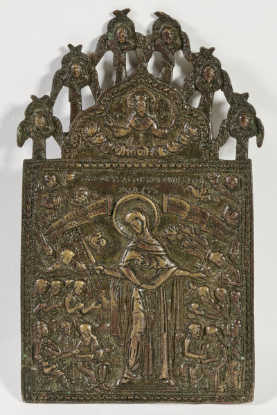 ikona z wizerunkiem Bogurodzicy stojącej w całej postaci wśród aniołów, chorych i potrzebujących trzymających banderole z cyrylickimi wezwaniami modlitewnymi; w zwieńczeniu półpostać Chrystusa Pantokratora.